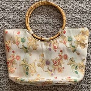 Vintage Chinese inspired handbag with circle bamboo handles